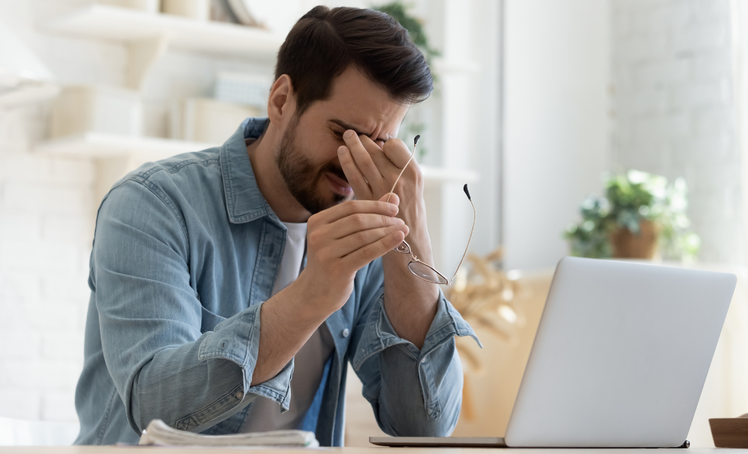 Man struggling with symptoms of fatigue due to age-related low testosterone.