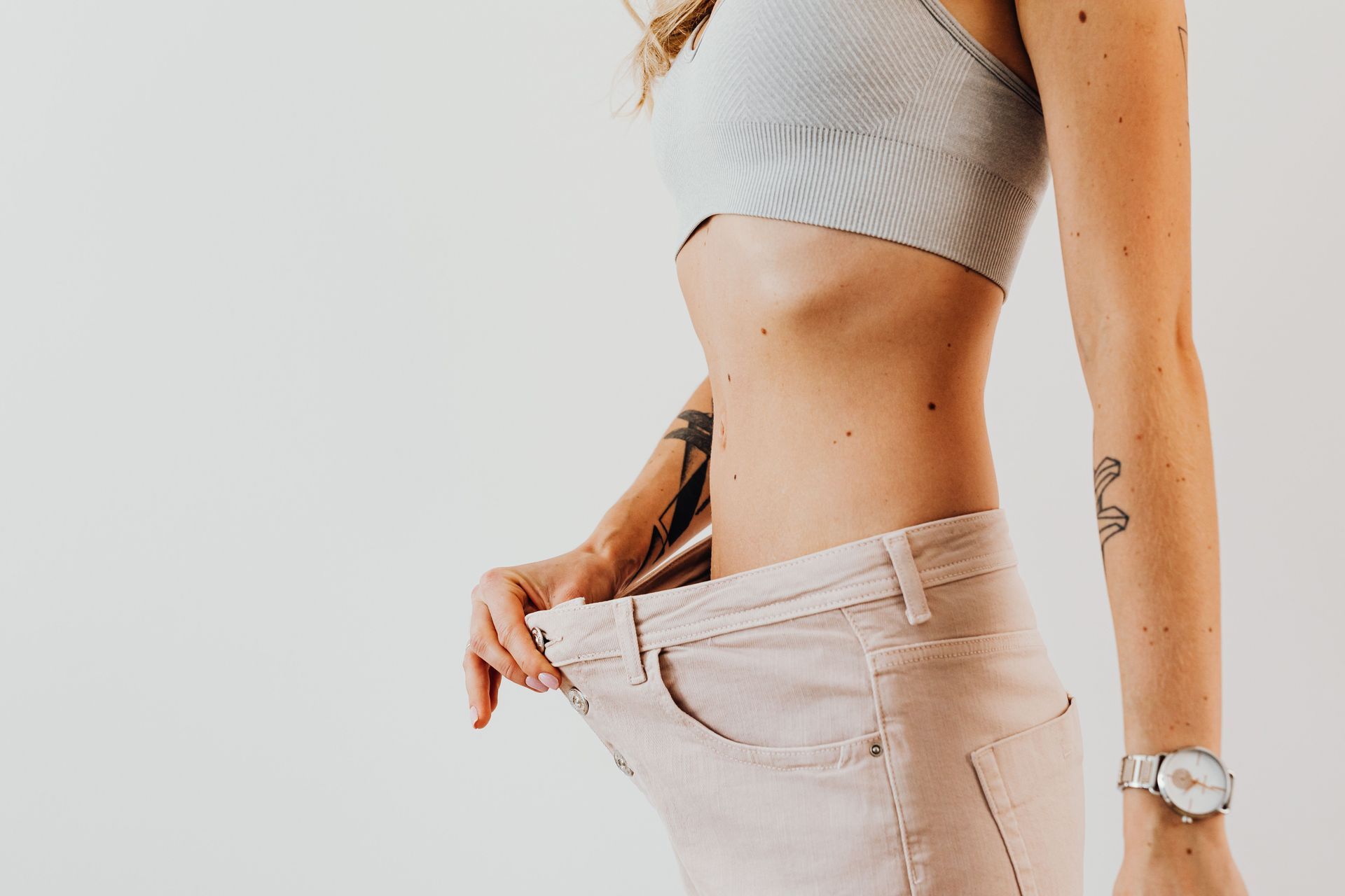 Individual achieving weight loss results and exploring new obesity medicine research including Retat
