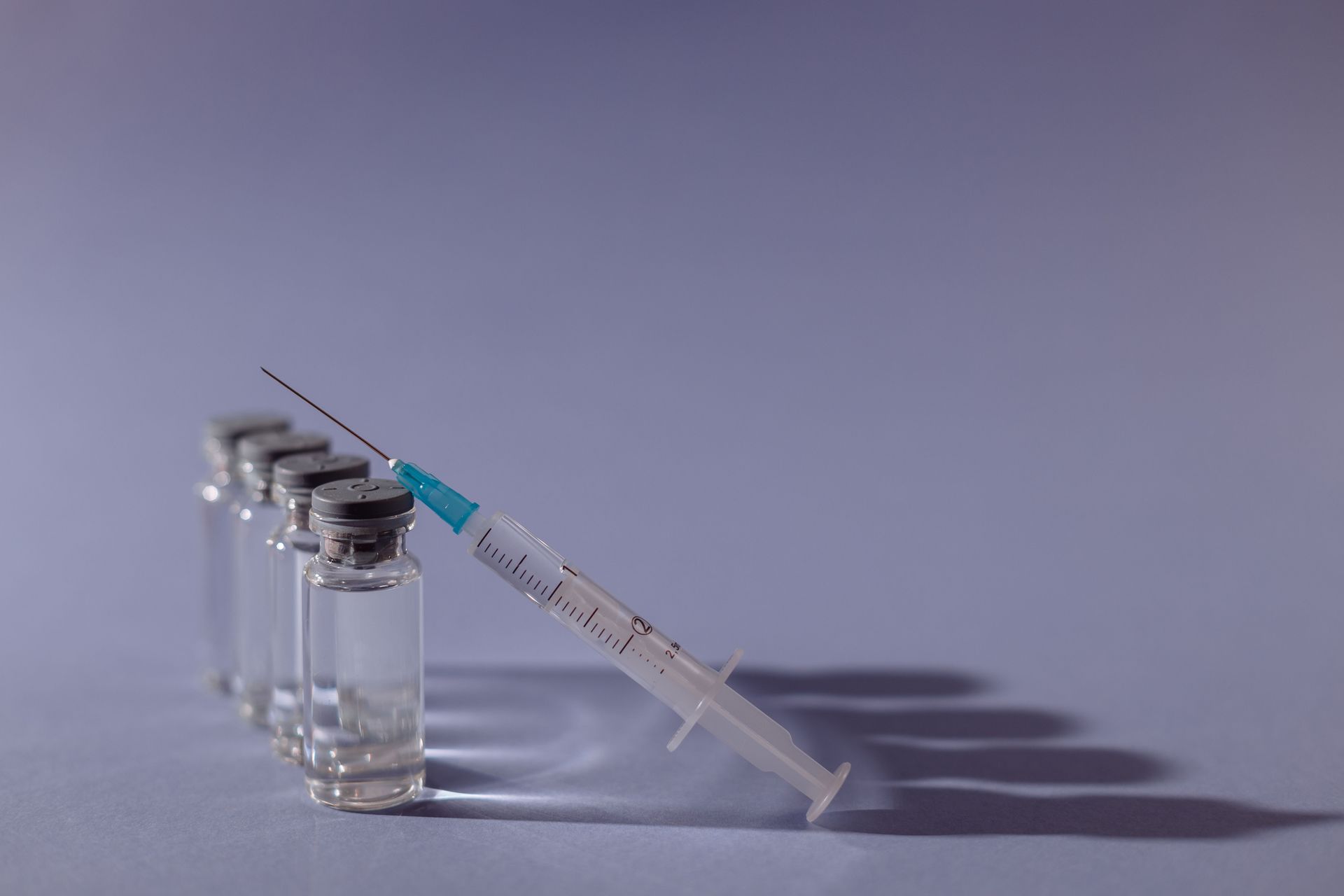 Vial and syringe of Retatrutide, an investigational medication being studied for weight loss.