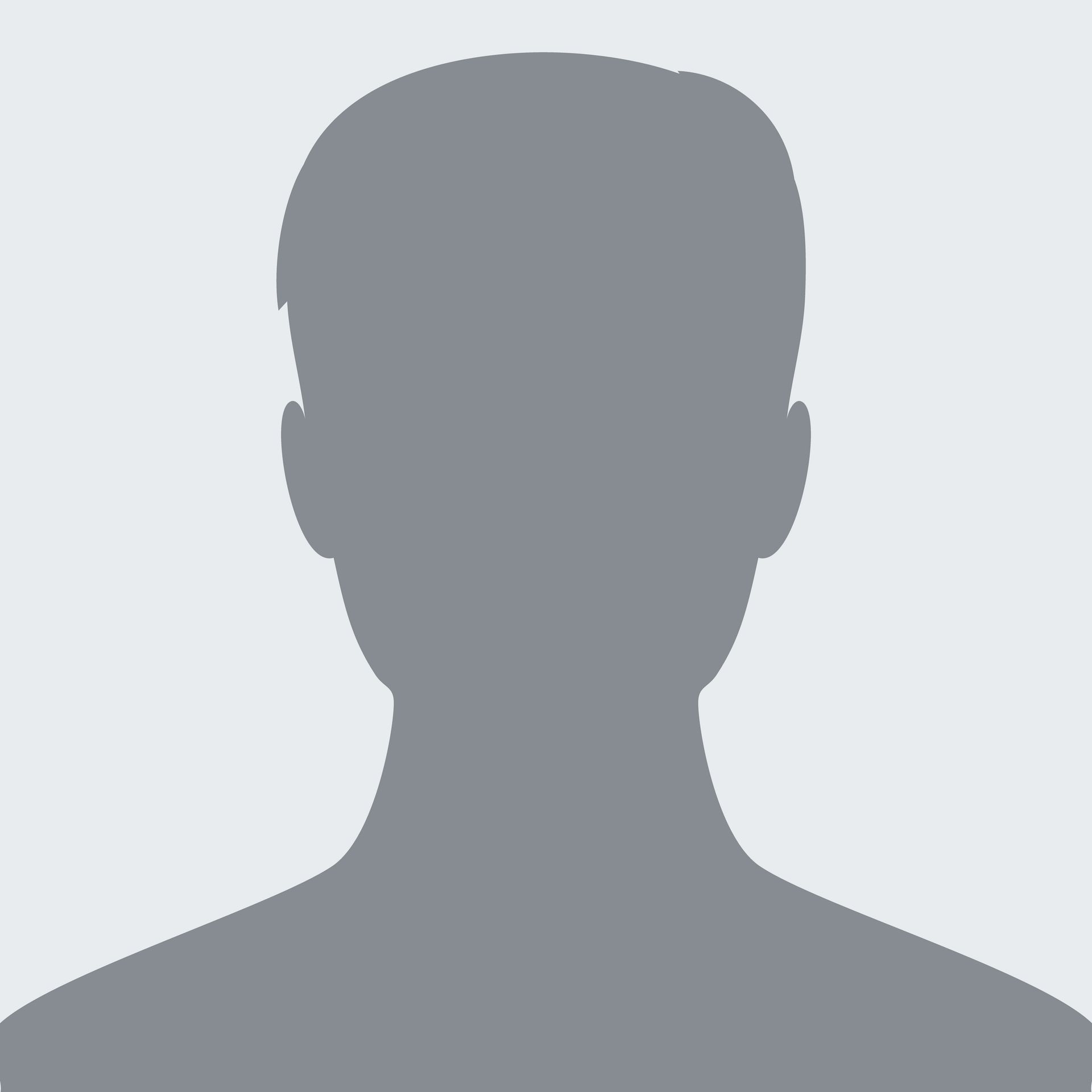 Silhouette of a person with short hair, against a gray background.