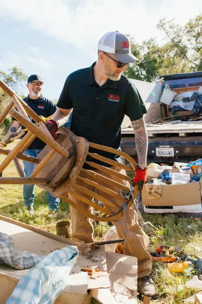 Hauling Team Removing Chair Hauling Team Removing Chair