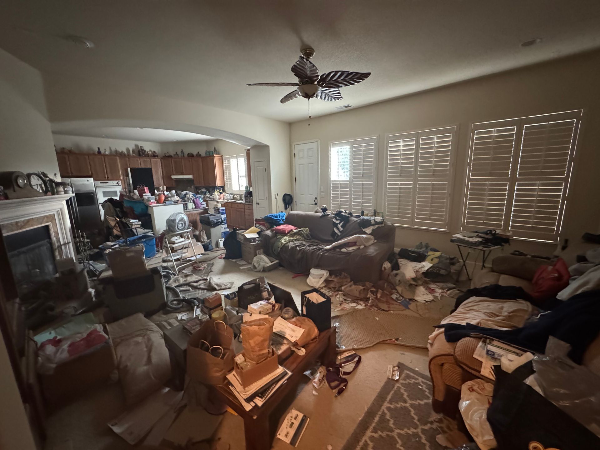 Cluttered house before full estate cleanout in Roseville CA