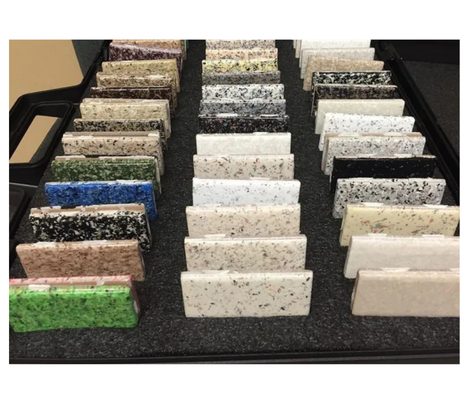 A display of different shades of green and blue paint