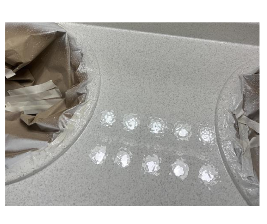 A bathroom with a bathtub , sink , toilet and shower.