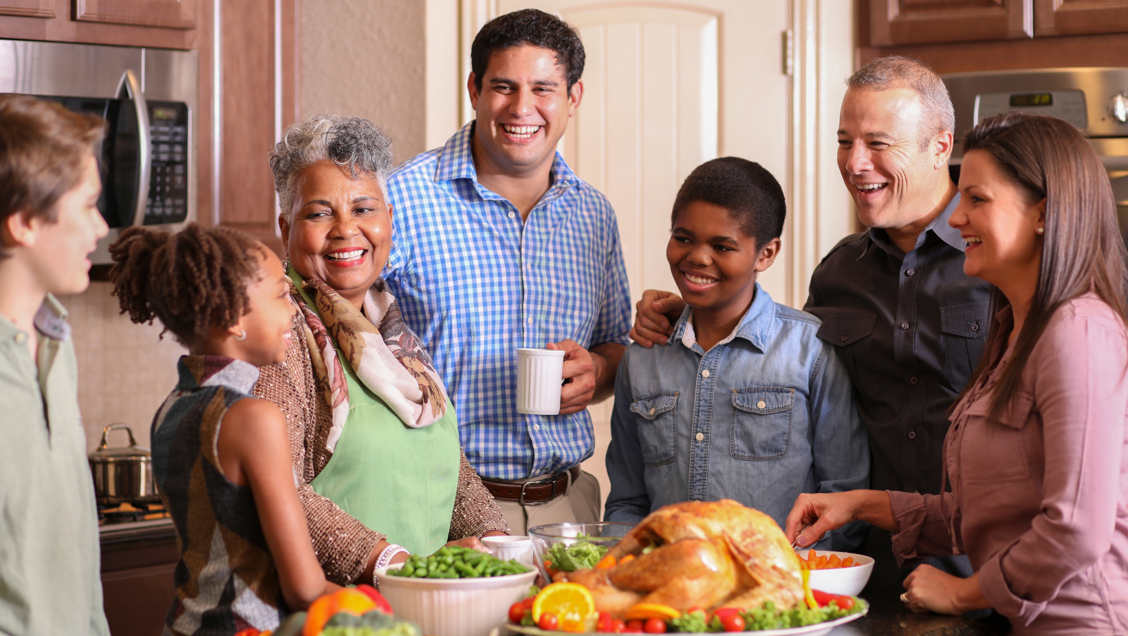 Friends and Family enjoying the holiday season together in a newly remodeled kitchen. 