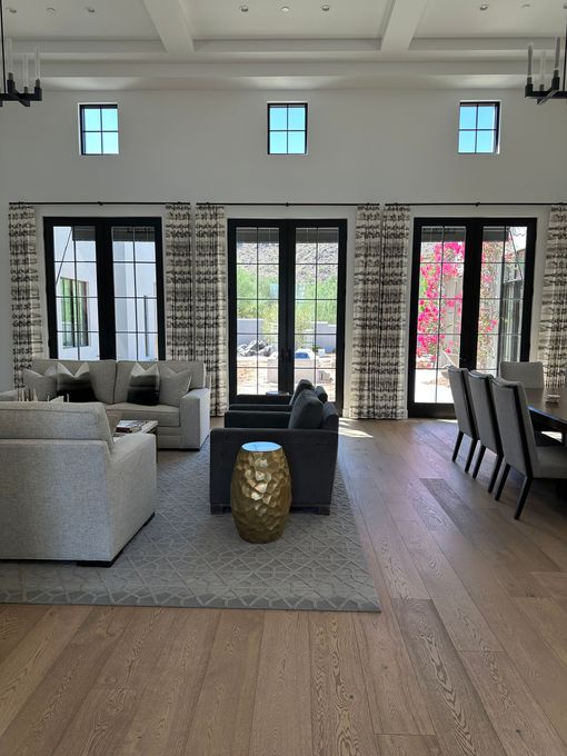 tall patterned panel curtains in living room