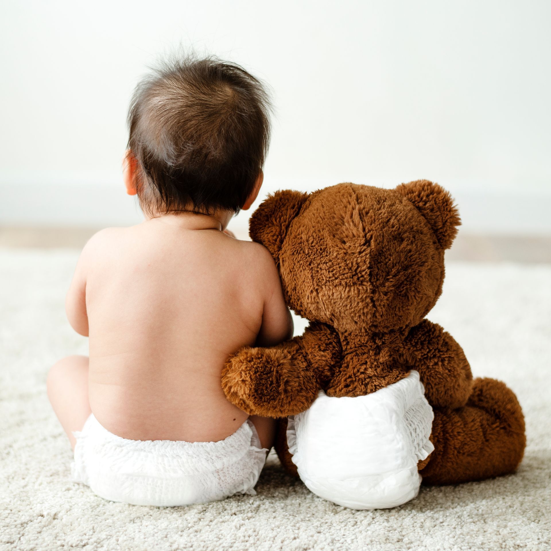 Baby with a teddy bear