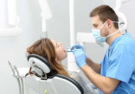 Dentist Checking Patient's Teeth — El Cajon, CA — Michael A Rogers DDS