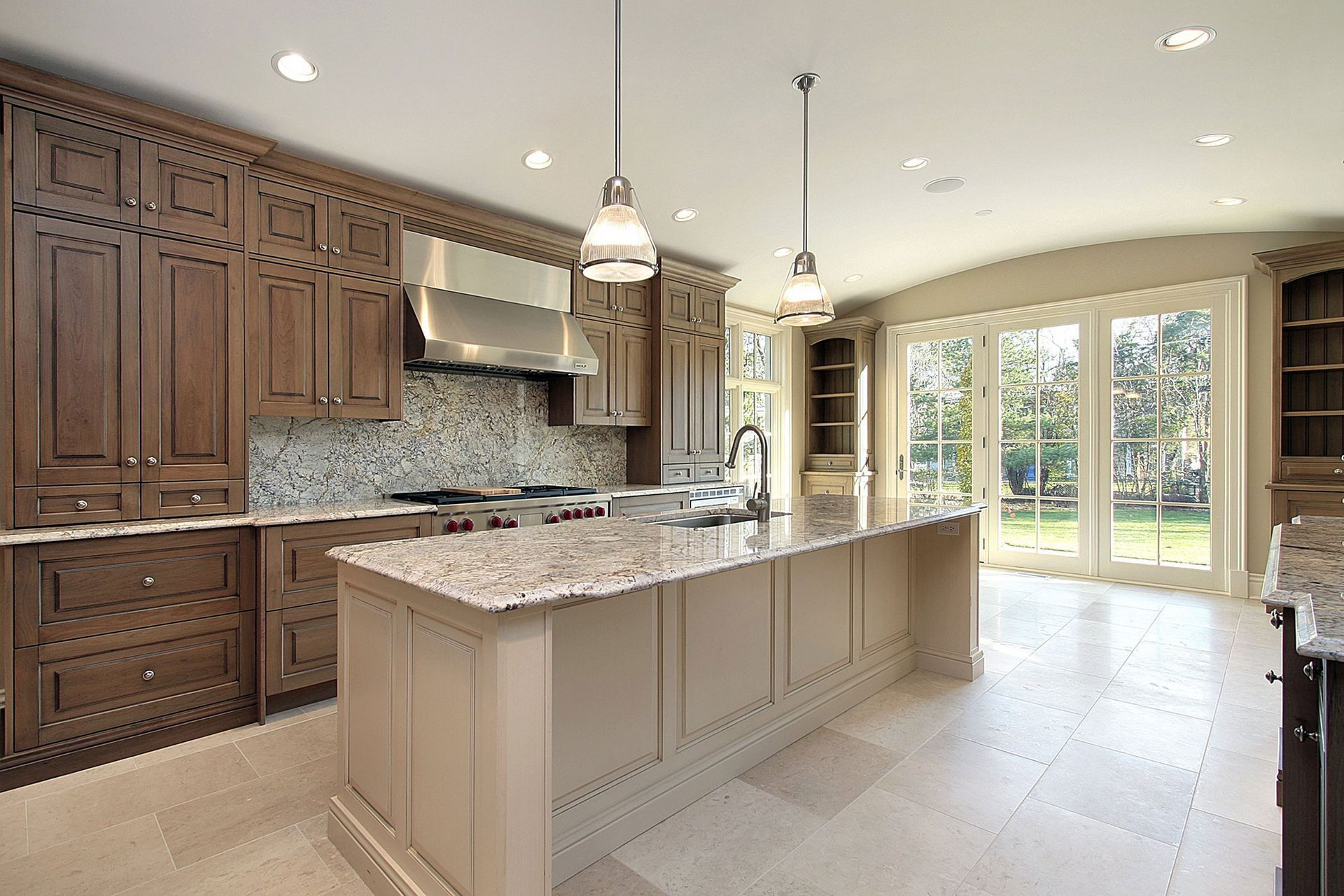 luxurious kitchen featuring wood cabinets in new construction home