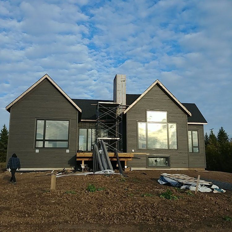 A large house with a scaffolding in front of it