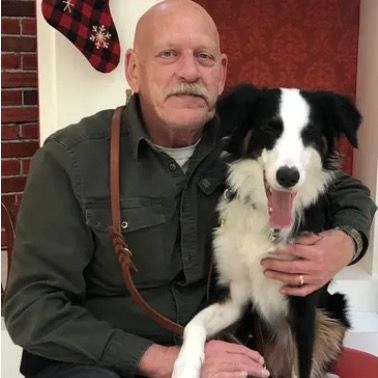 Randy Smith with his dog, Karma