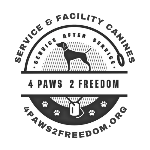 a man with a dog on his lap is using a computer