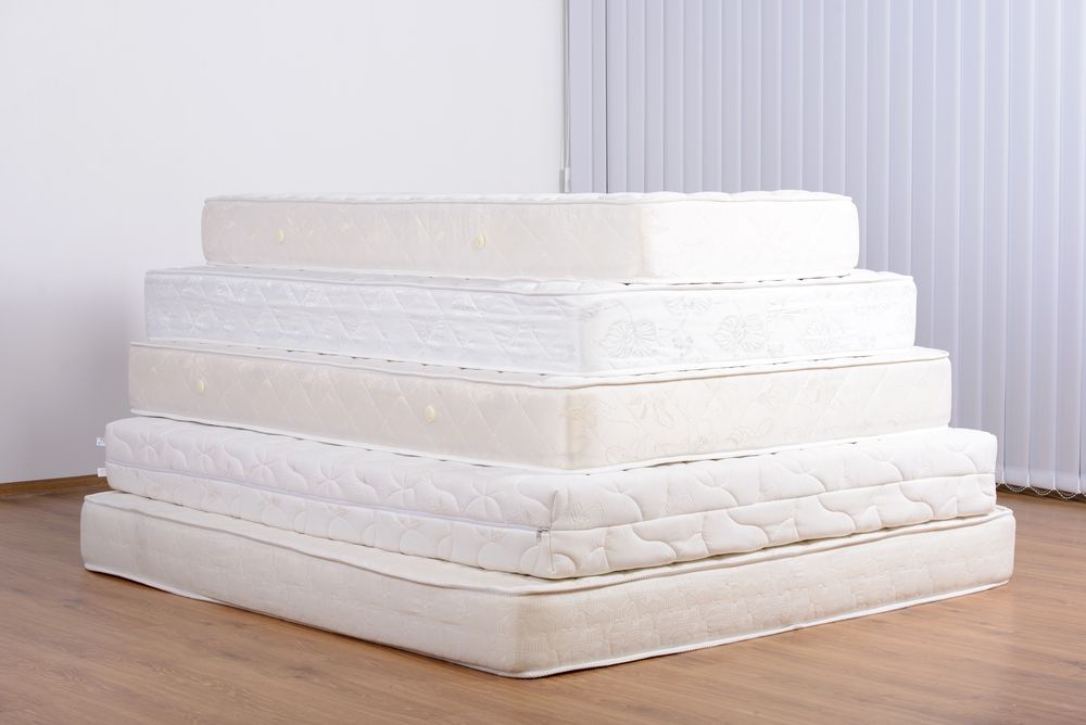 Stack of Different Size Mattresses — Gold Coast Linen Hire in Tugun, QLD