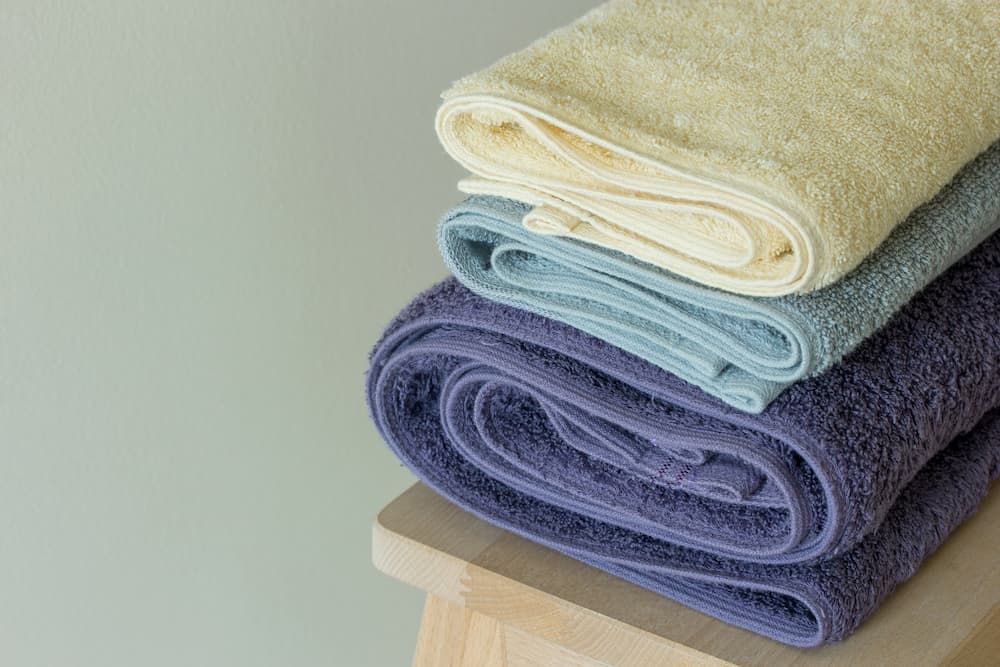Stack of Bath Towels — Gold Coast Linen Hire in Tugun, QLD
