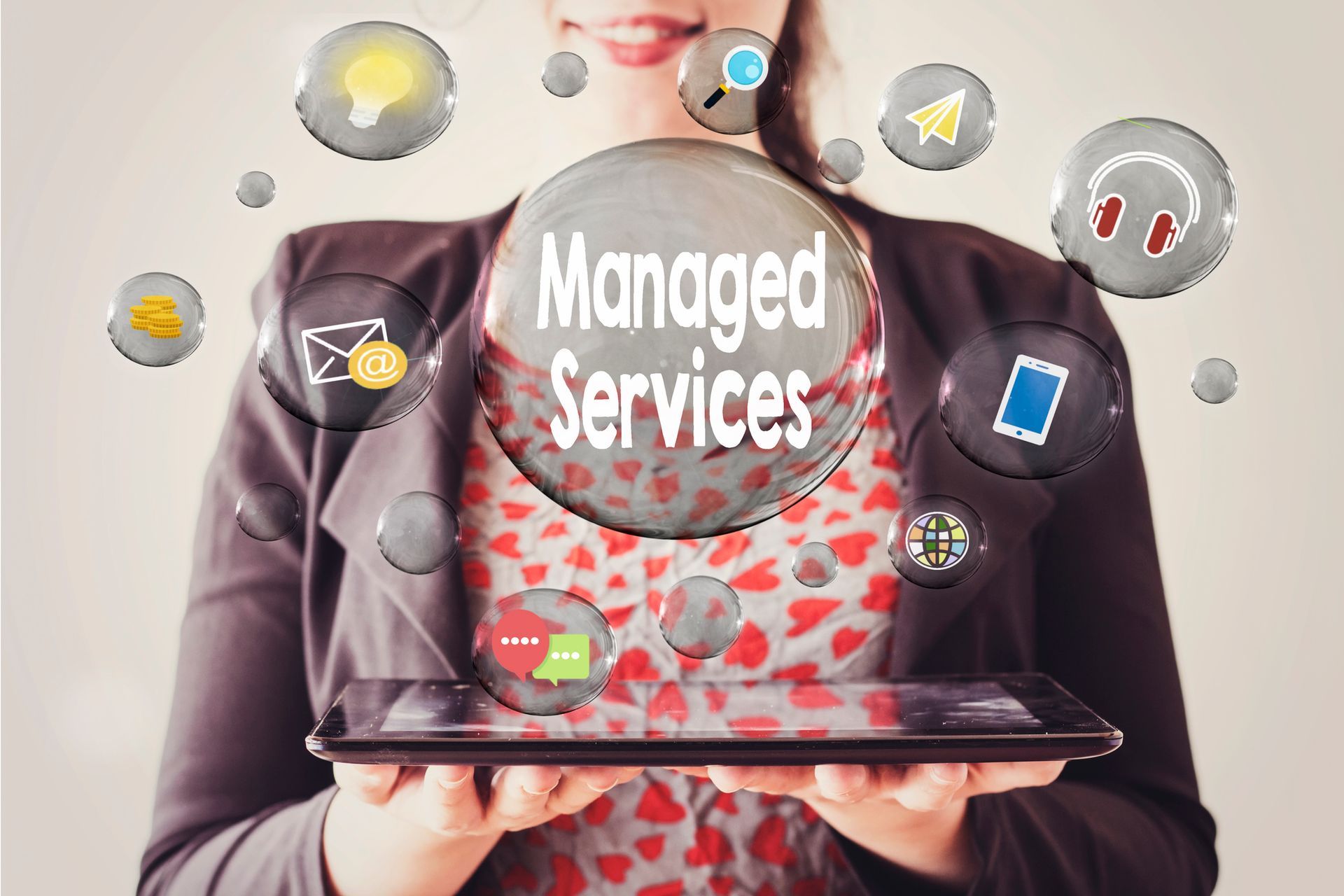 A woman holding a tablet. Representation of managed IT services provider in Youngstown, OH.