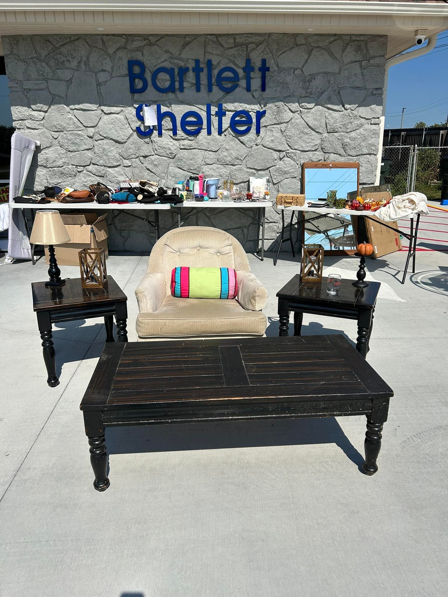 Outdoor furniture display in front of 