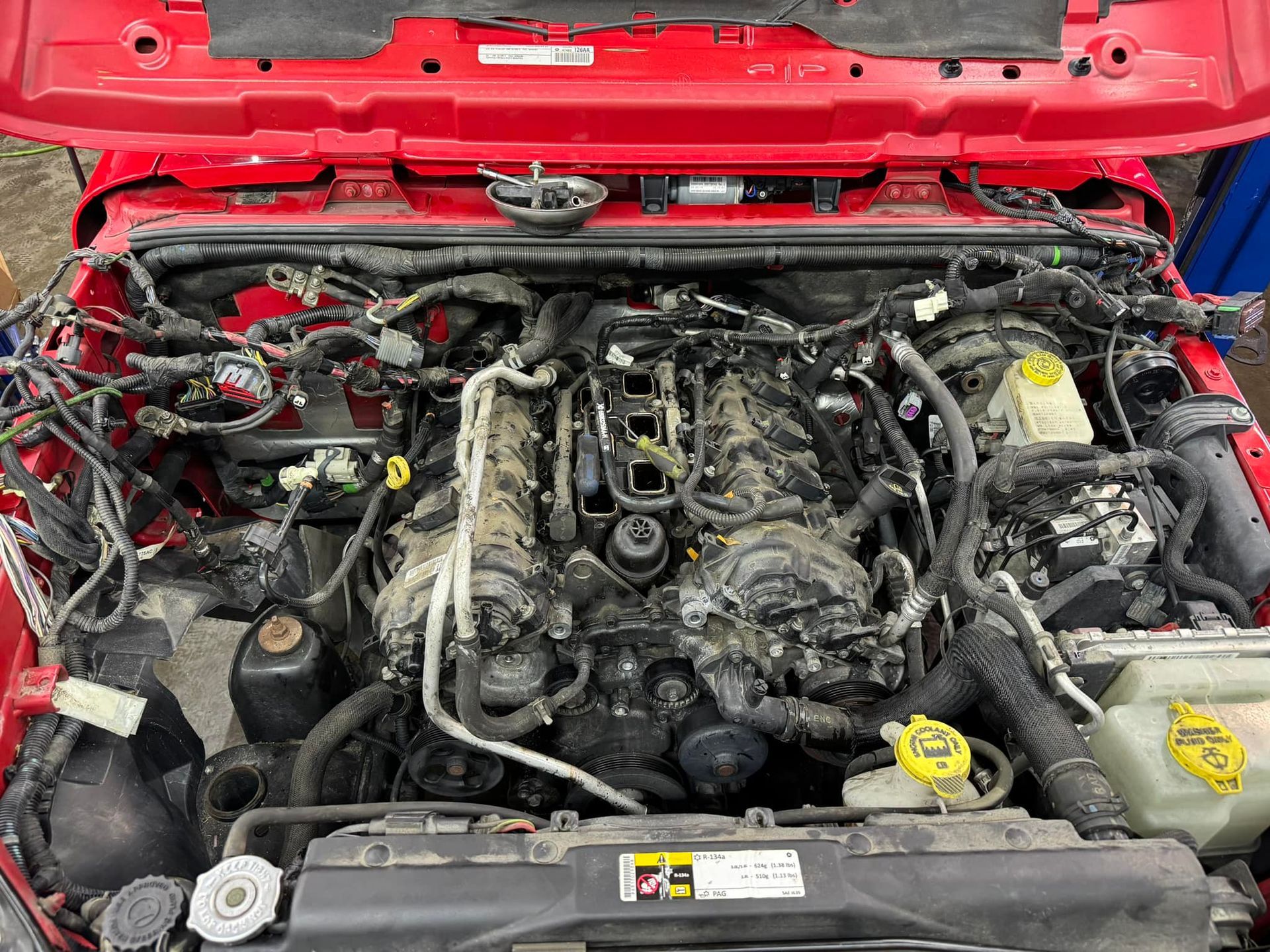 Engine Bay With Components Removed For Repair | Greenfield Auto Repair