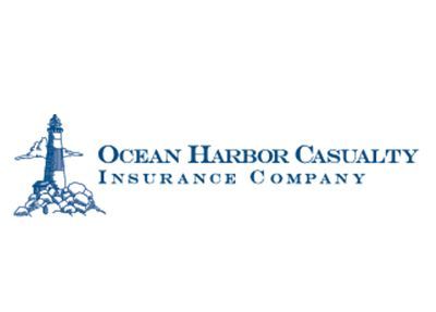 Blue lighthouse on rocks; Ocean Harbor Casualty Insurance Company logo.