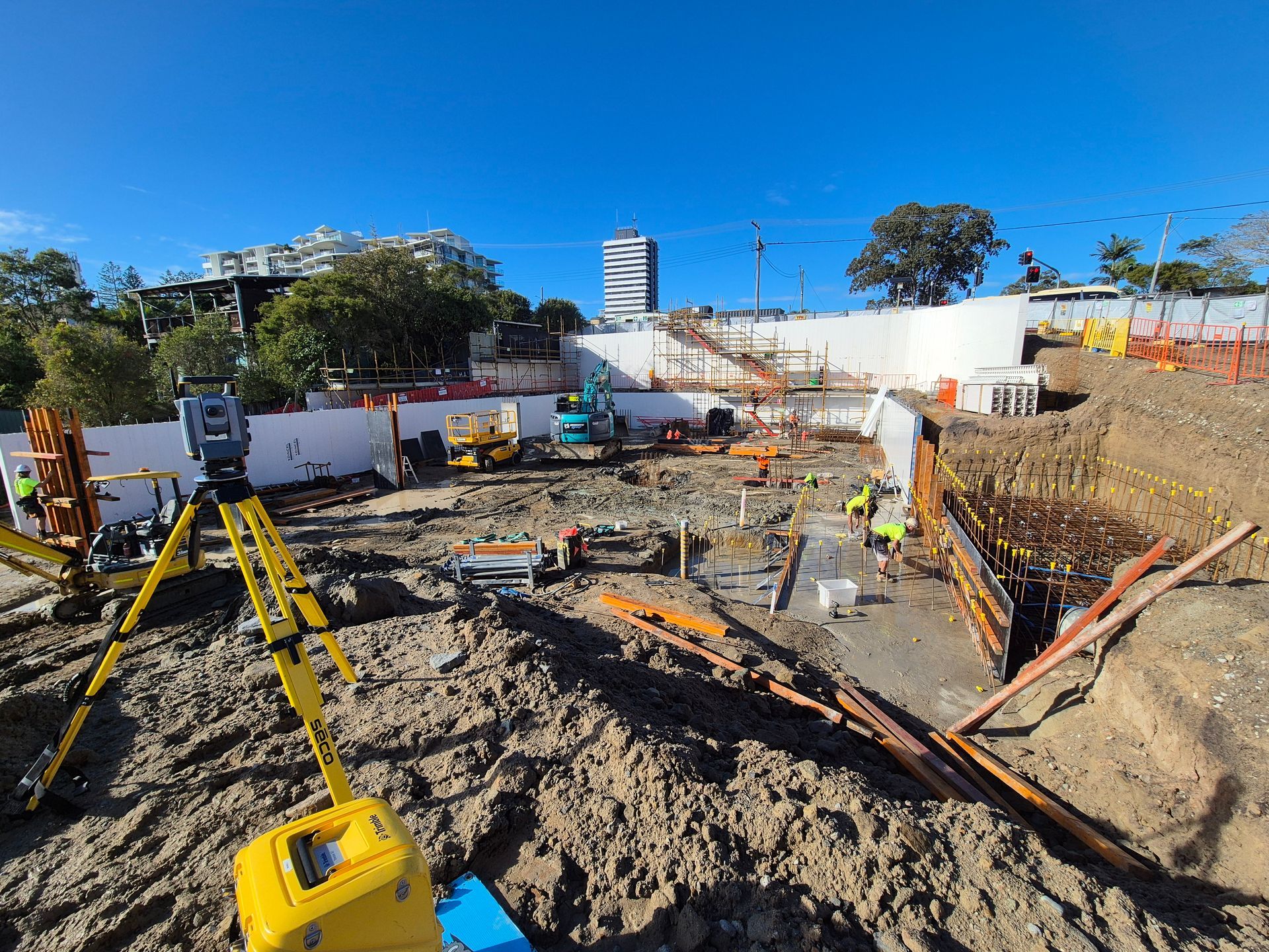Construction Site With Equipment, Workers — Next Step Surveying in Aroona, QLD