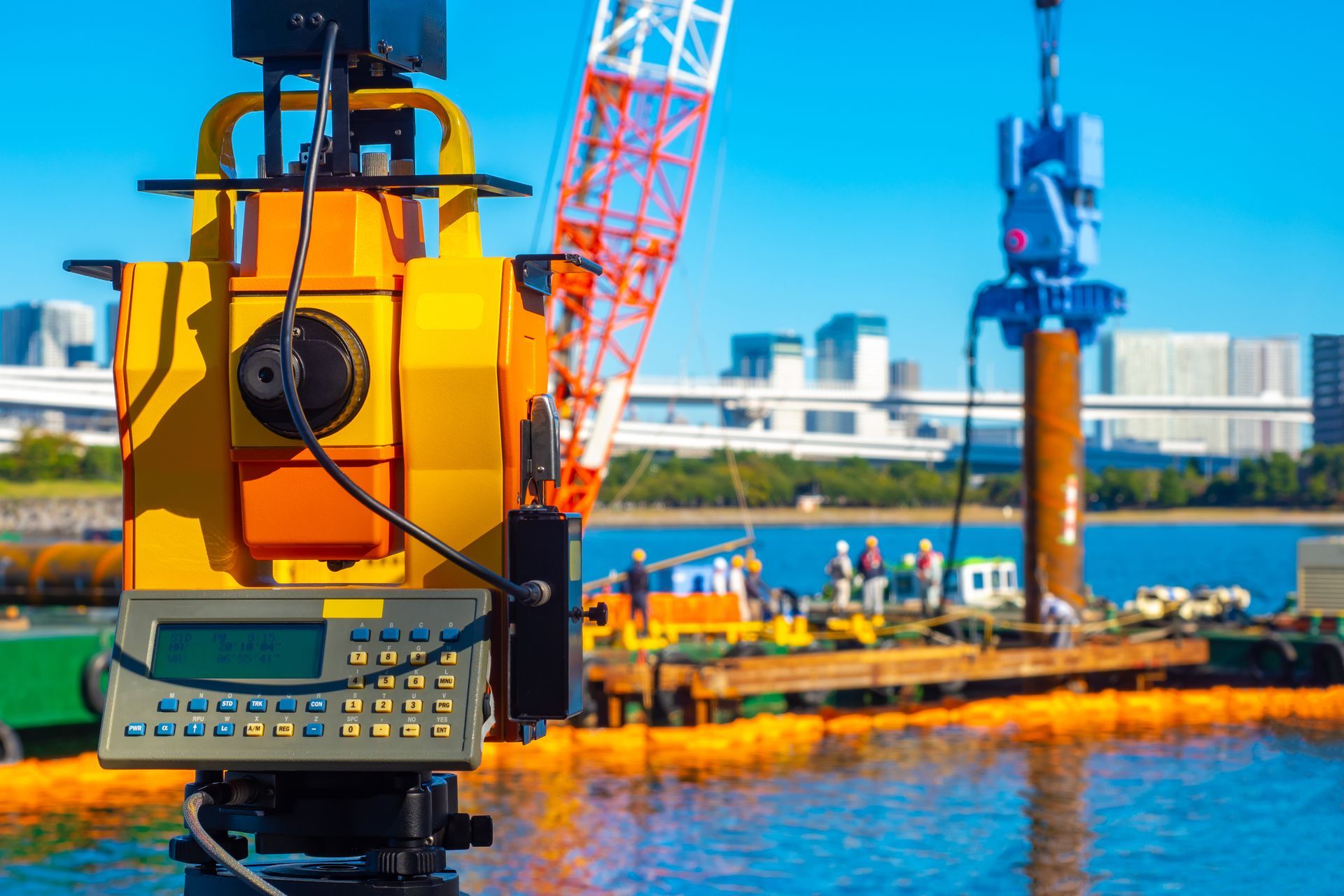 Surveying Equipment on a Pier, With Construction — Next Step Surveying in Moreton Bay, QLD