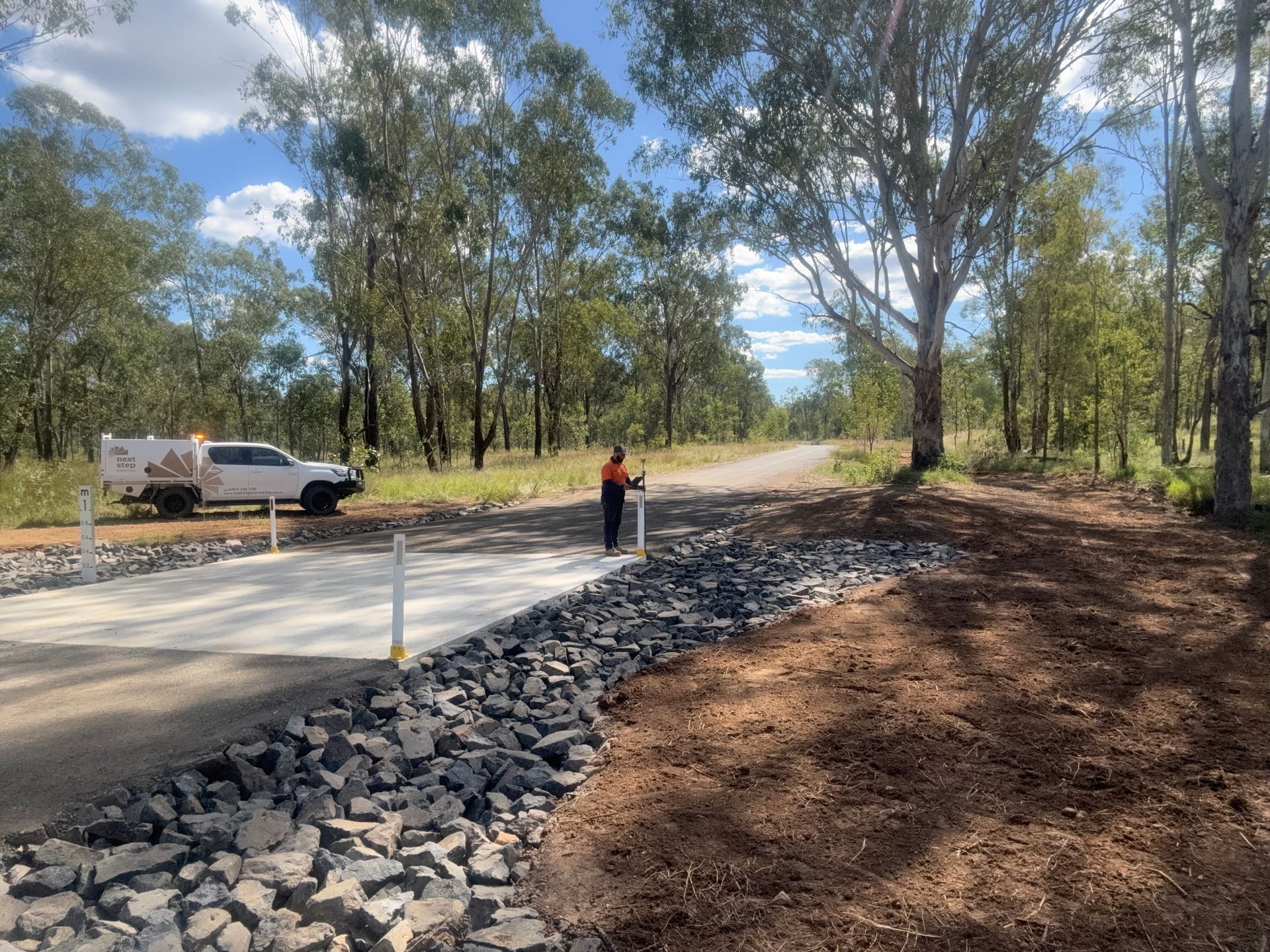 Construction of Road and Drainage With Truck — Next Step Surveying in Brisbane, QLD