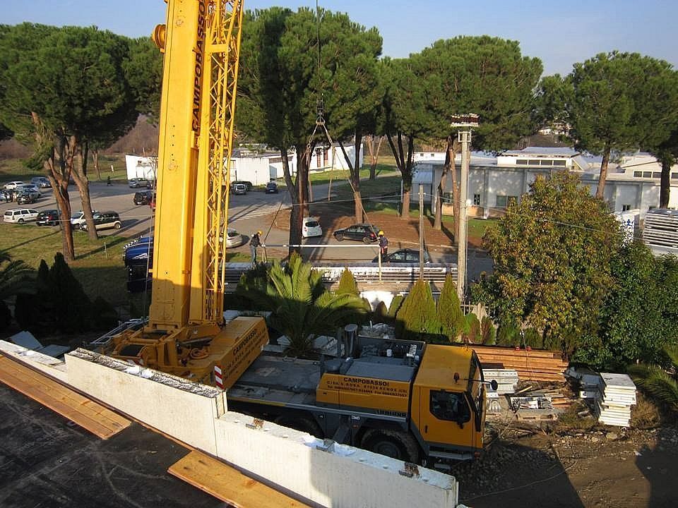 Copertura con pannelli in lamiera su struttura in legno lamellare - Piscina comunale Rende (CS)