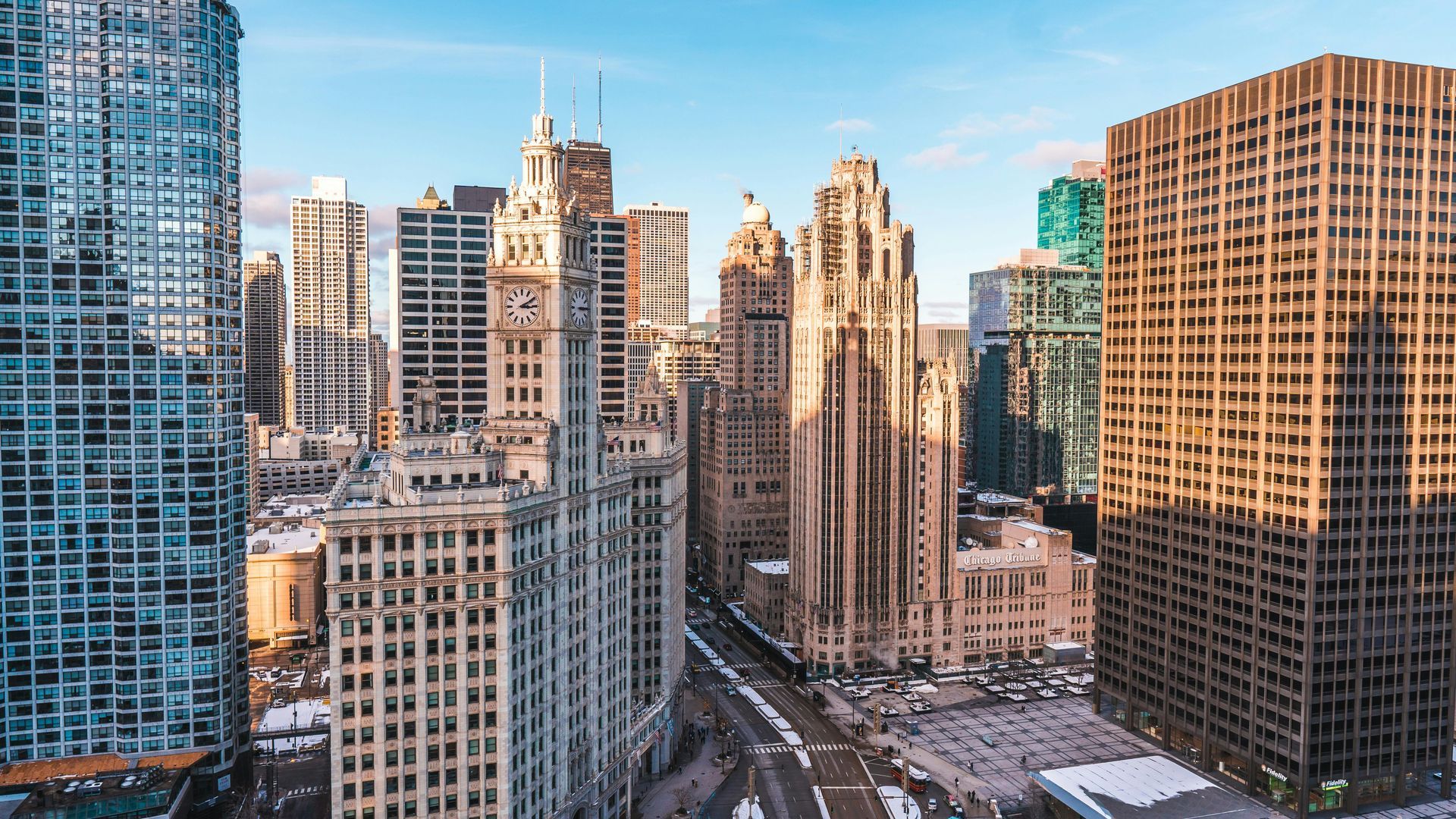 An aerial view of a city skyline with lots of tall buildings.