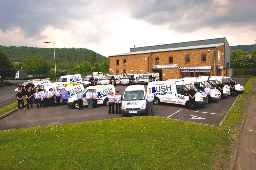 Bush Healthcare vans are parked in front of the company Headquarters in Aberdare