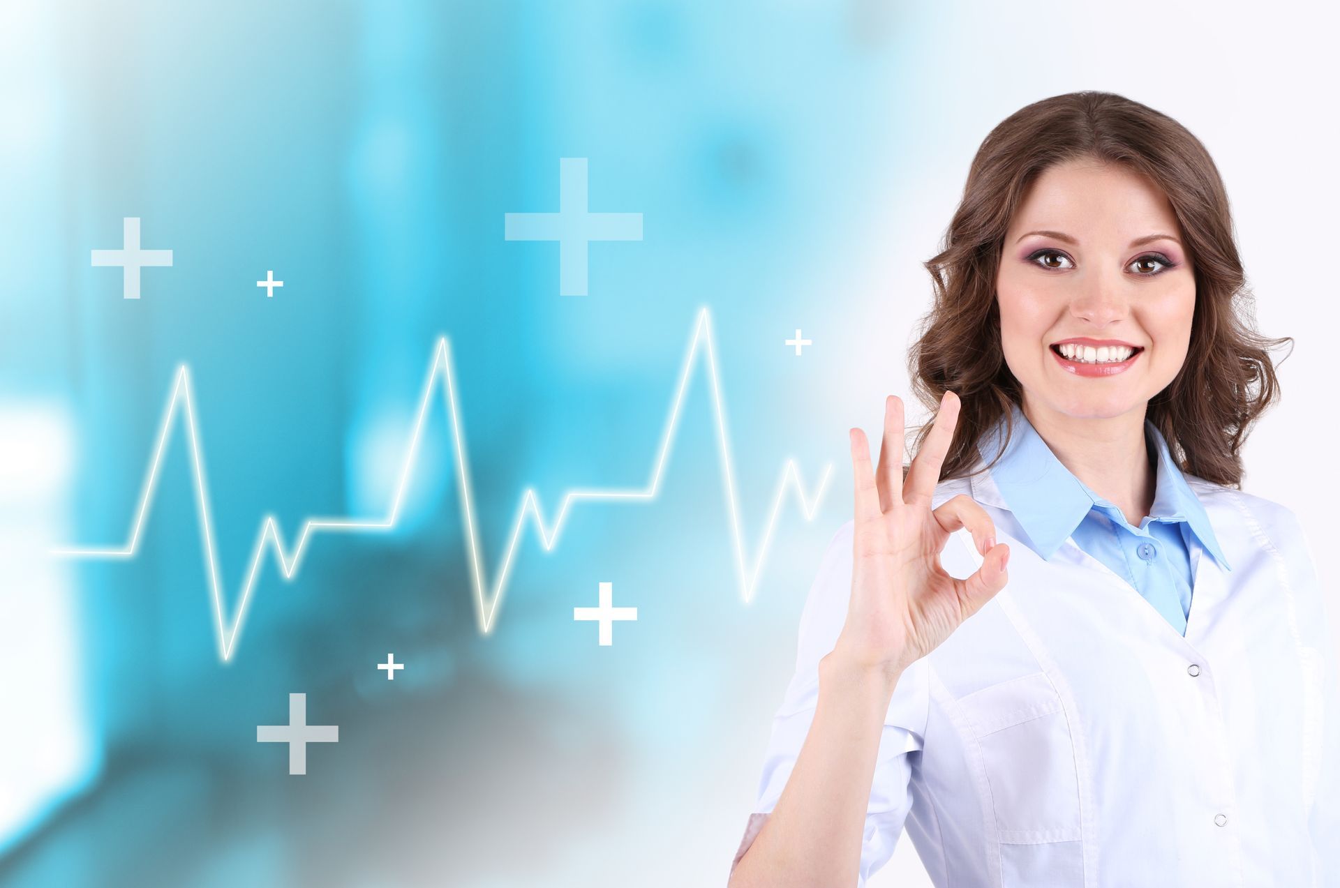 a female doctor giving an ok sign in front of a heartbeat graph, representing the close relationship DEZINES has with large global medical brands