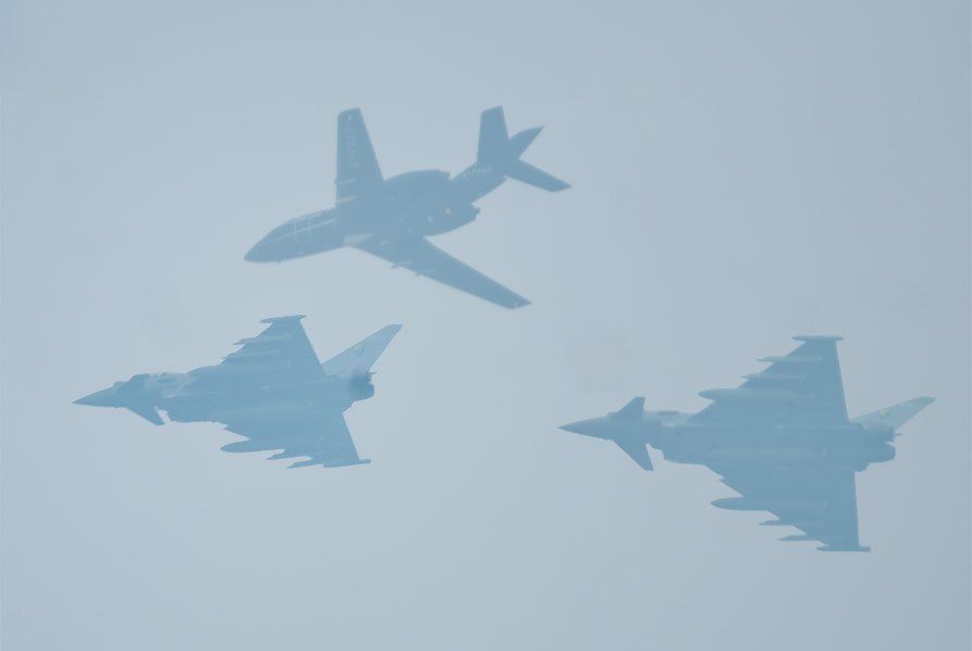Typhoon fighter jets providing escort to a NATO flight over Cardiff International Airport, Wales.
