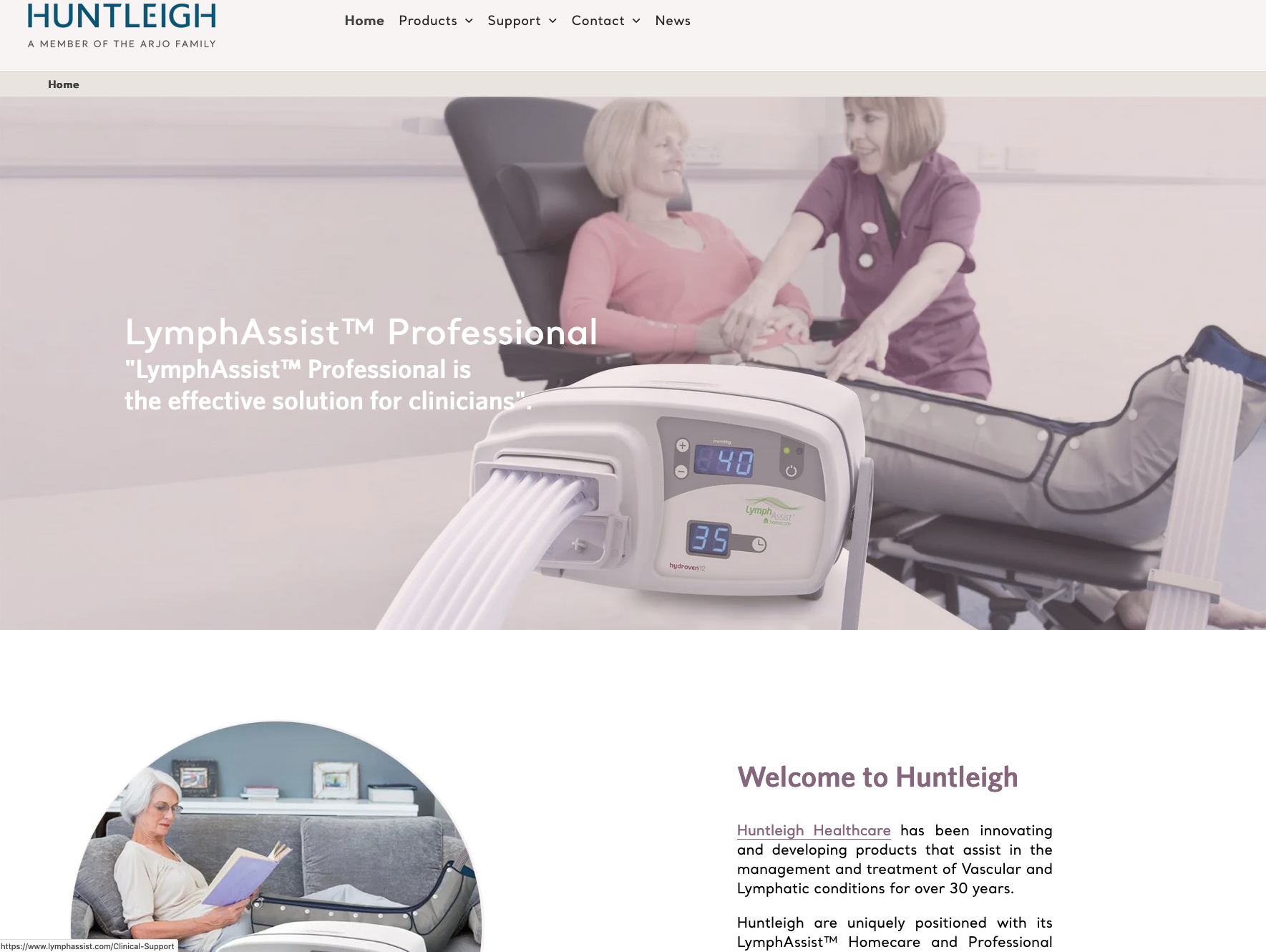 A woman is laying in a chair with a nurse standing next to her