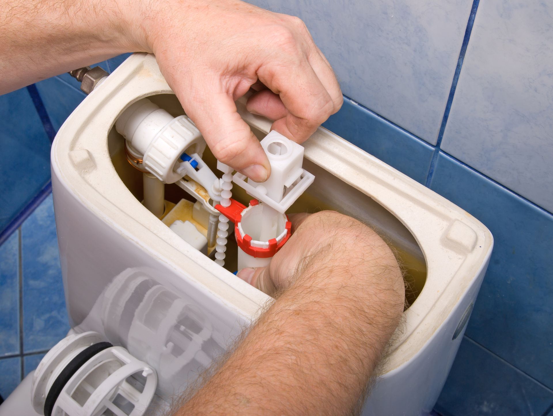 Plumber Repairing A Toilet — Kogarah, NSW — One Touch Plumbing