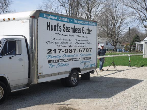 Company truck in job site — gutter repair services in Potomac, IL
