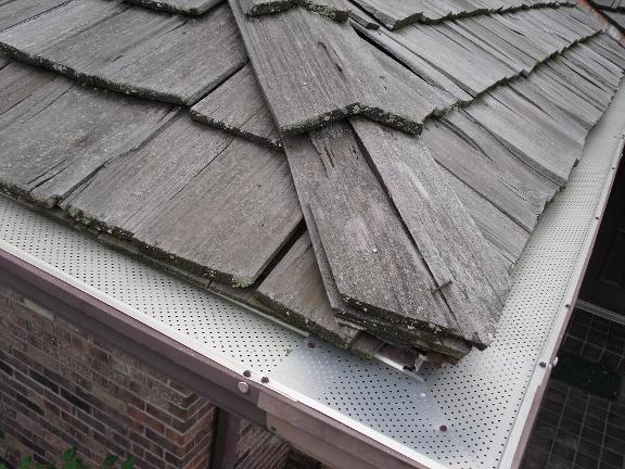 View of the roof and gutter — Gutter system repair services in Potomac, IL