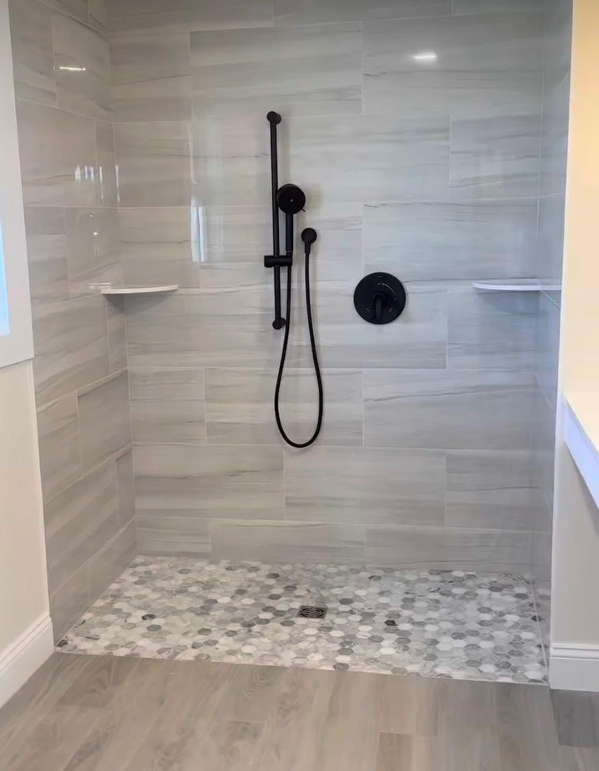 A wall with a lot of pipes and a sign that says ' emergency ' on it