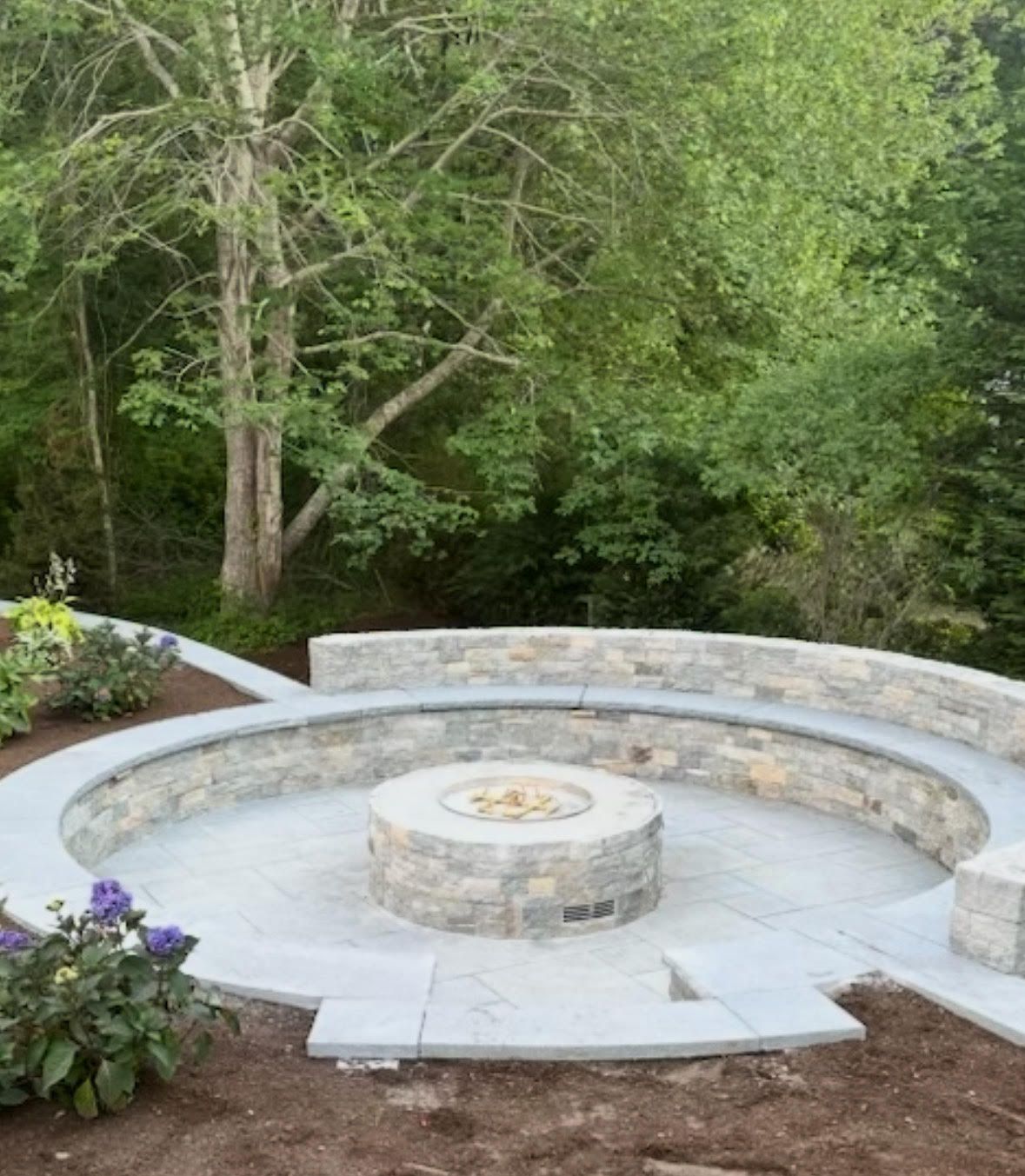 A closet with copper pipes and a white shelf