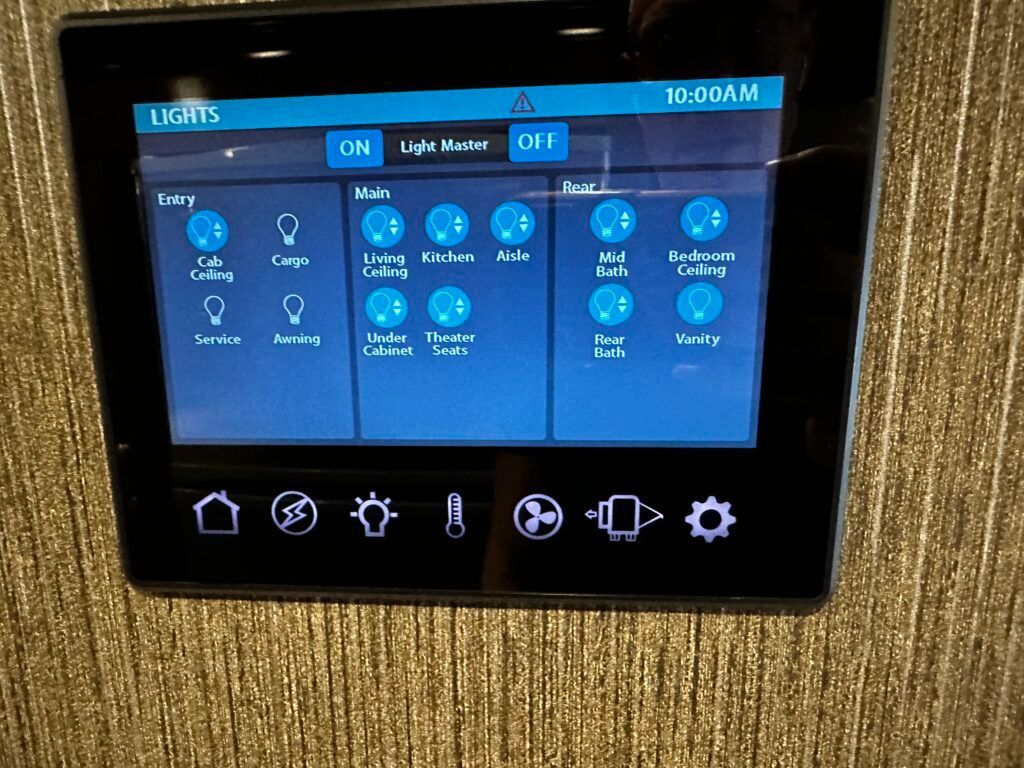 A thermostat with a screen that says lights on it
