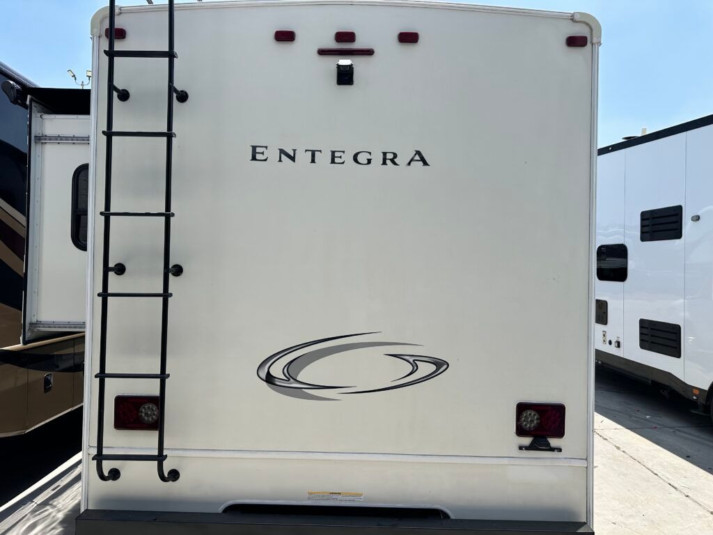A white rv with the word integra on the back