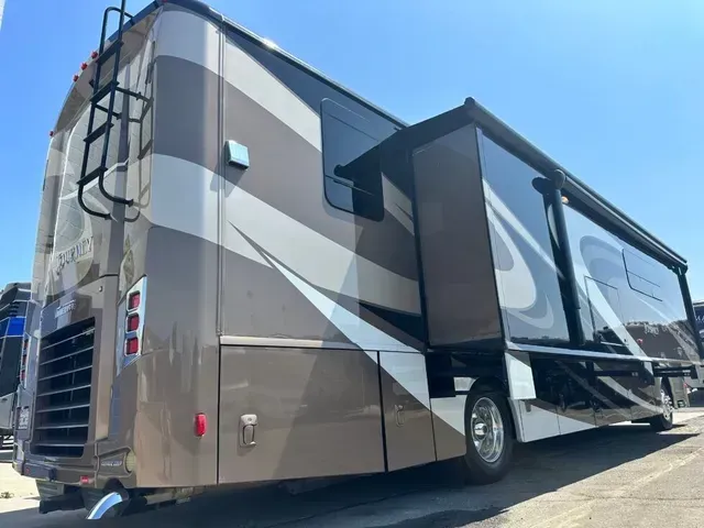 A row of white leather chairs in a rv.