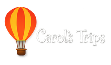 Hot air balloon logo with the text “Carol’s Trips” in white script on a white background