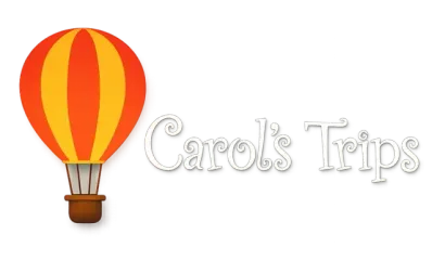 Hot air balloon logo with the text &ldquo;Carol&rsquo;s Trips&rdquo; in white script on a white background