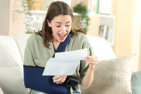 Disabled Woman Receiving Good News | Columbus, OH | Life Wealth Solutions
