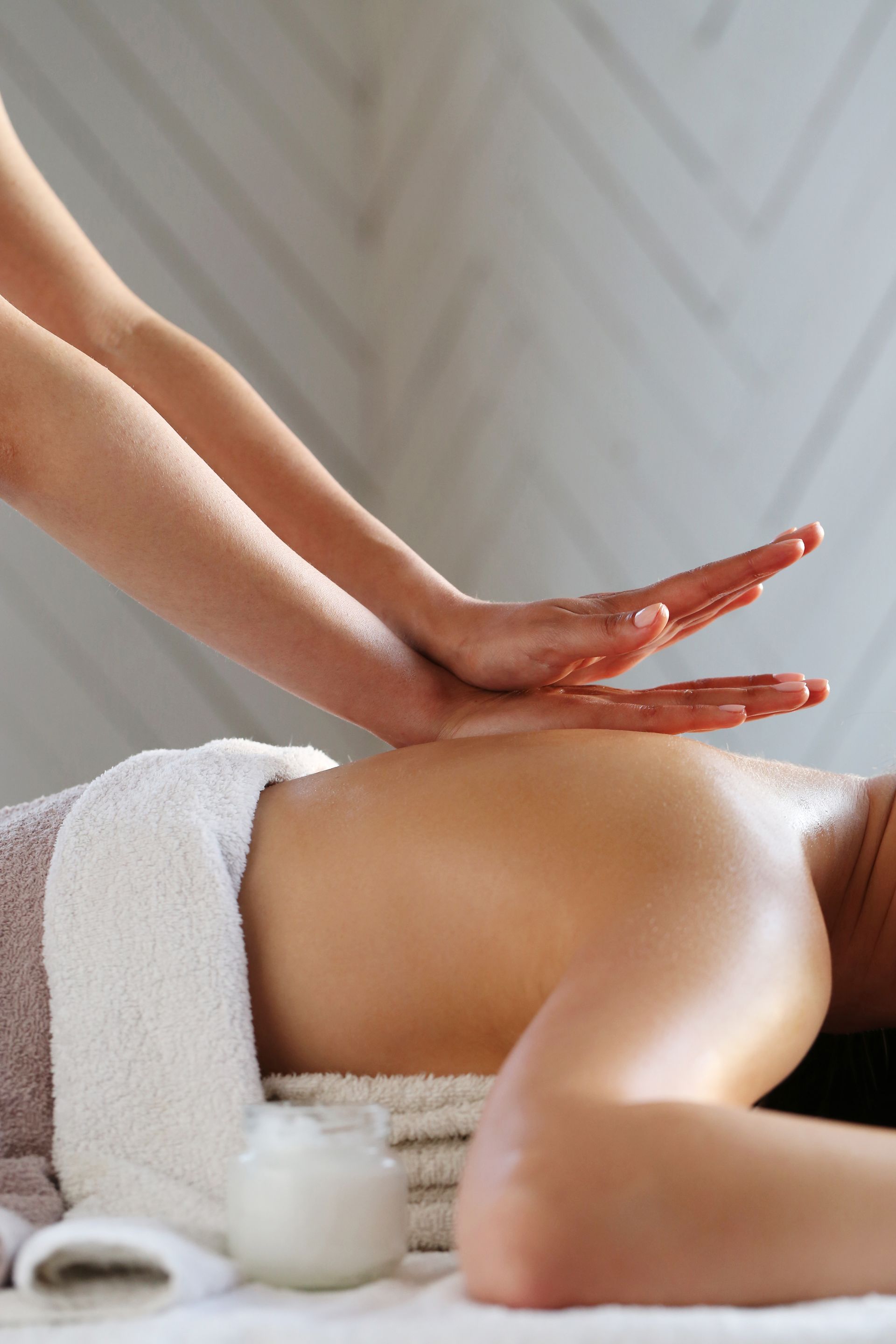 A woman is getting a massage at a spa.