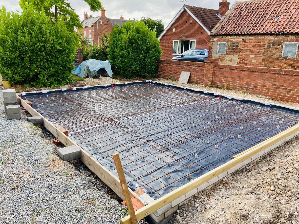 new brick garage build process images roof work curved arches timber garage doors by buildjunky.com