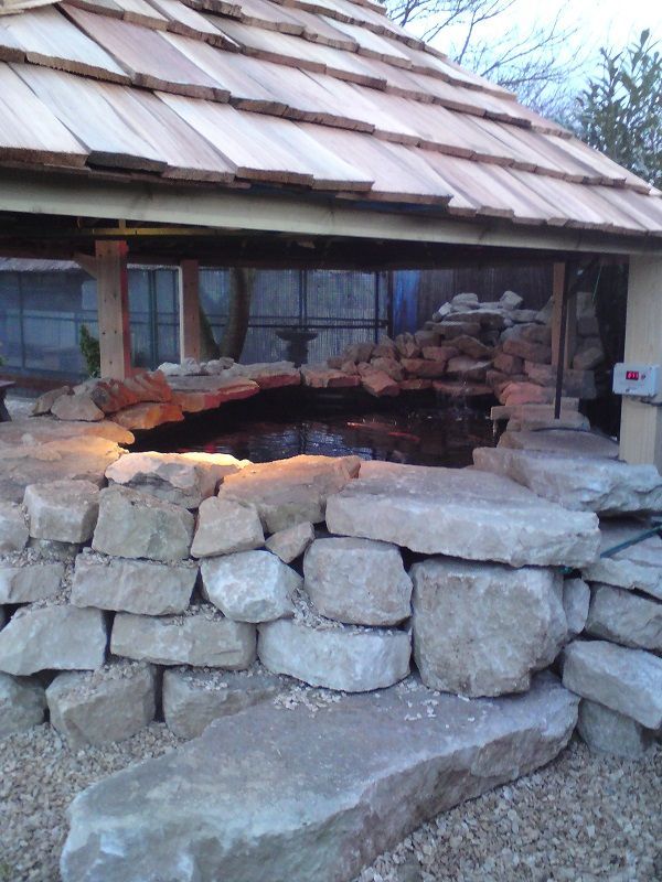 Large koi pond and waterfall  by buildjunky.com