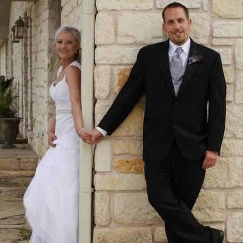 bride and groom holding hands