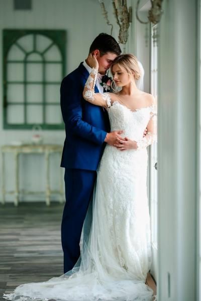 bride and groom embracing