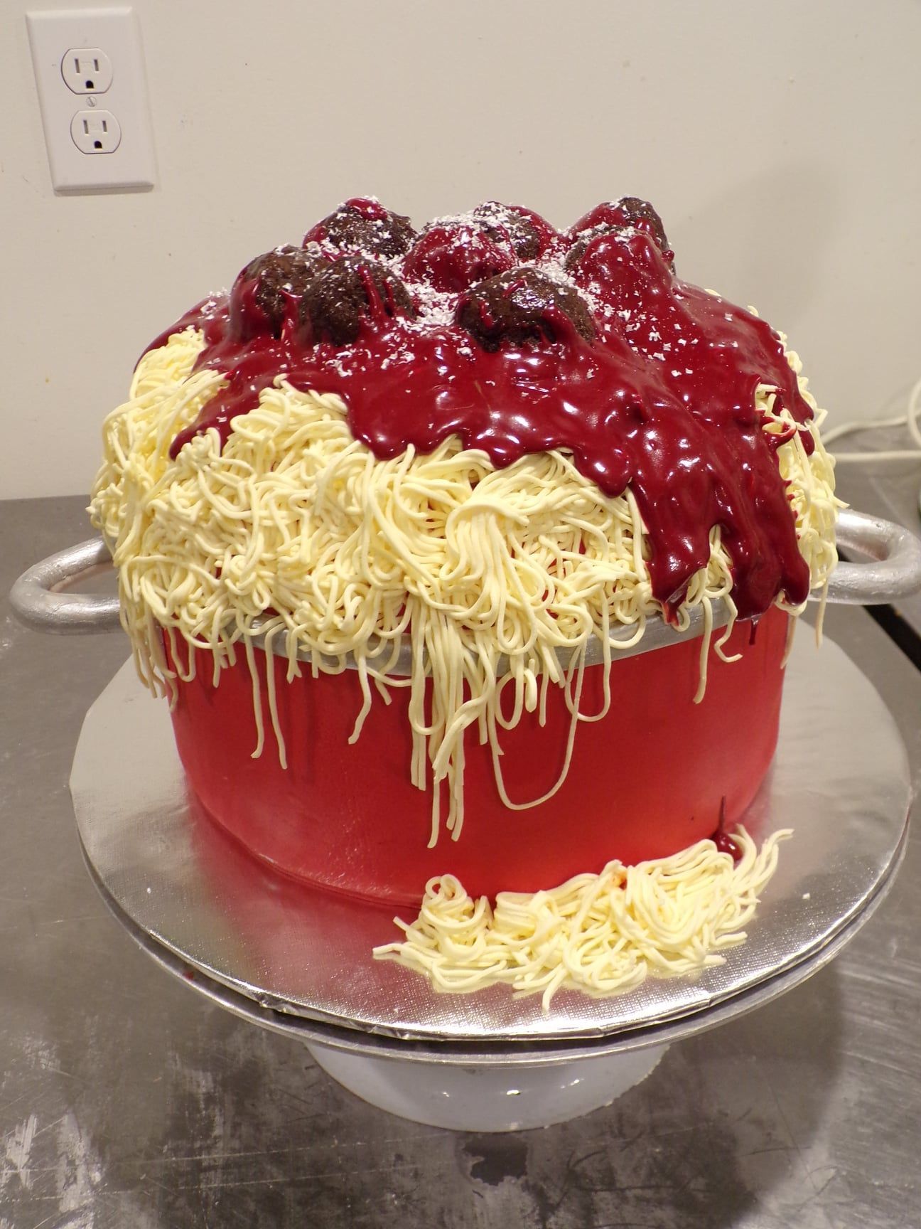 Person sliding cake — Hawley, PA — Sweet Sensation Cakes