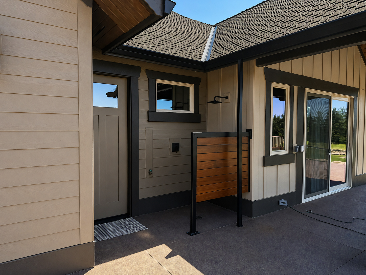 Custom covered patio and outdoor kitchen area built by Elite Construction and Design in Vancouver, WA