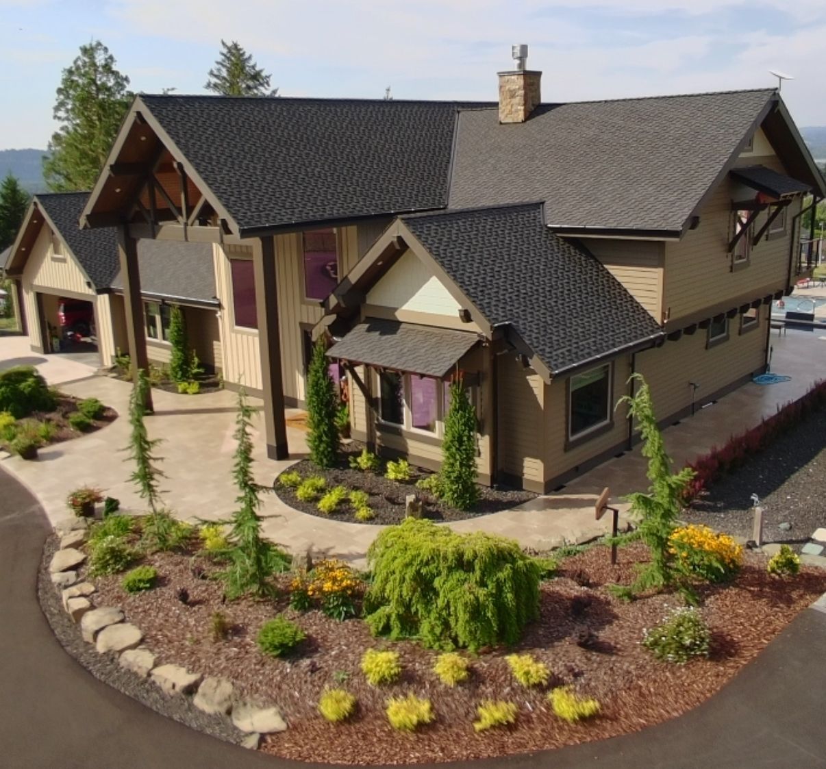 Luxury custom home with detailed landscaping built by Elite Construction and Design in Vancouver, WA